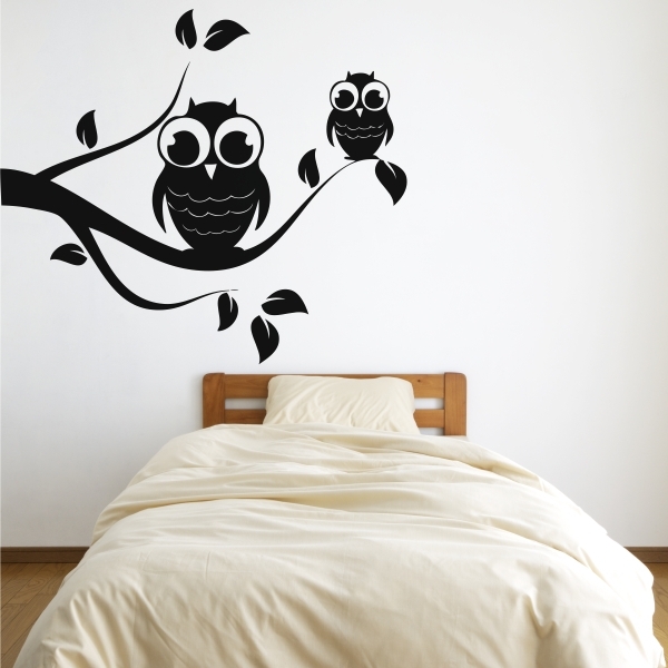 Vinilo decorativo buhos sobre rama